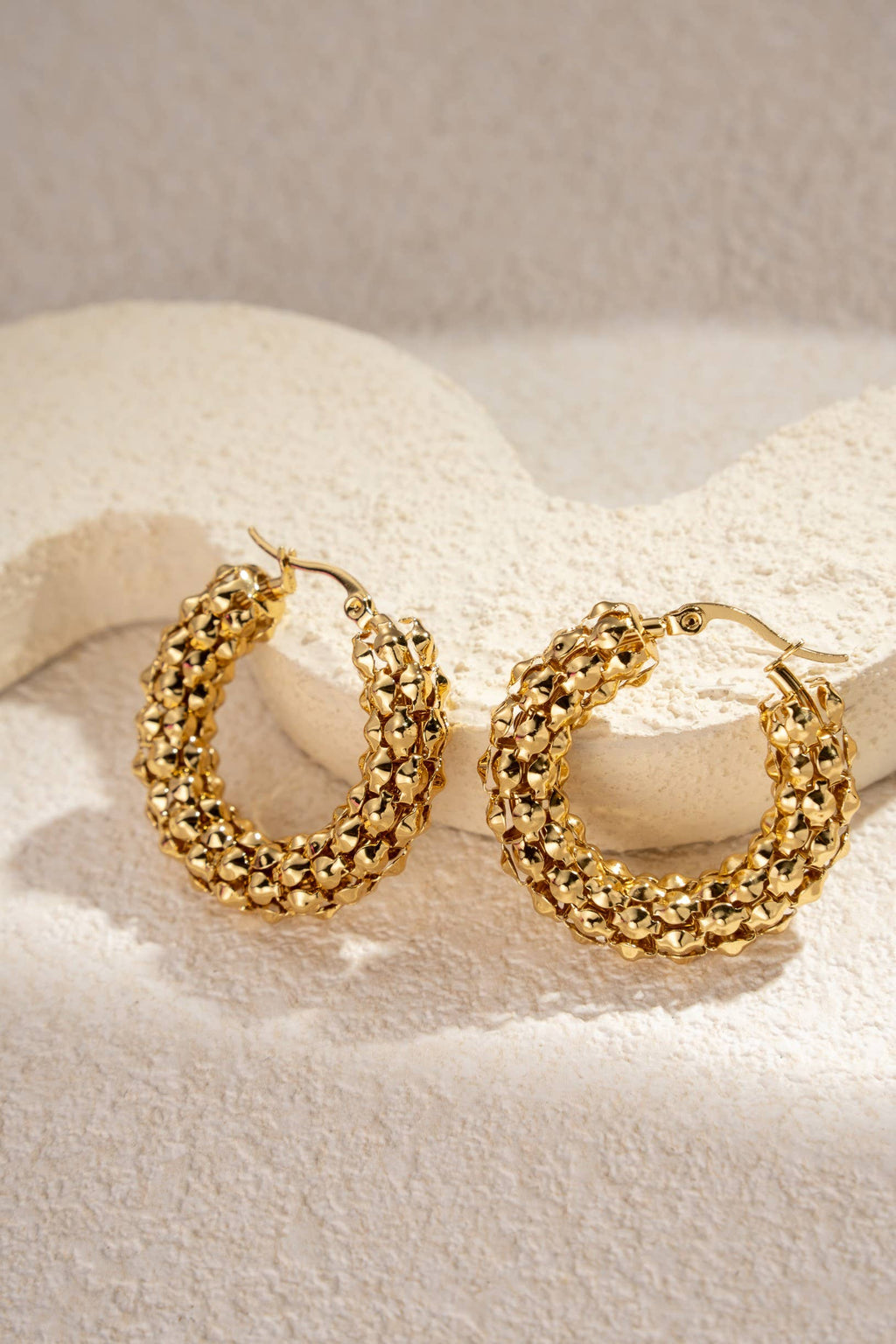 Gold stainless steel woven hoop earrings