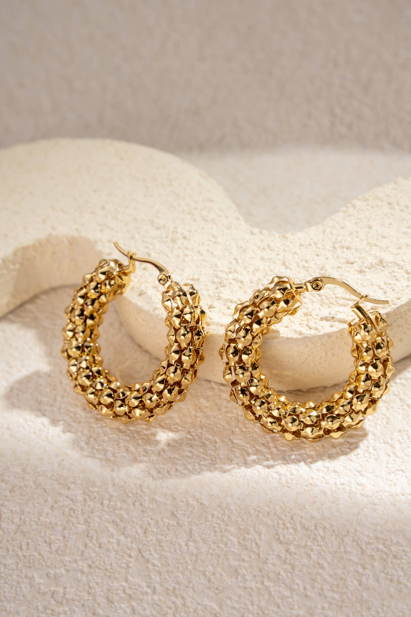 Gold stainless steel woven hoop earrings
